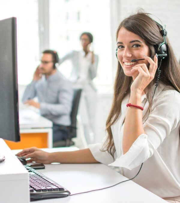 stock-photo-young-friendly-operator-woman-agent-with-headsets-working-in-a-call-centre-712414813-transformed