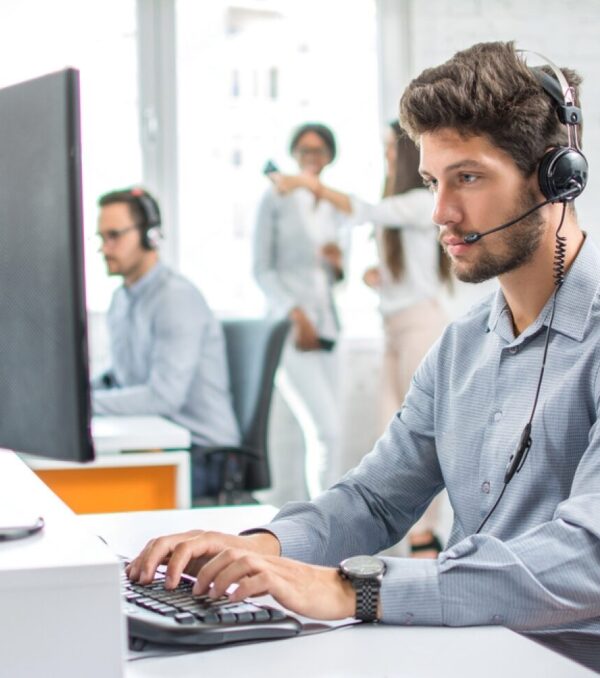 stock-photo-young-handsome-male-customer-support-phone-operator-with-headset-working-in-call-center-722489089-transformed
